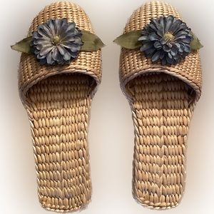 Womens straw woven slippers with blue floral toe embellishment